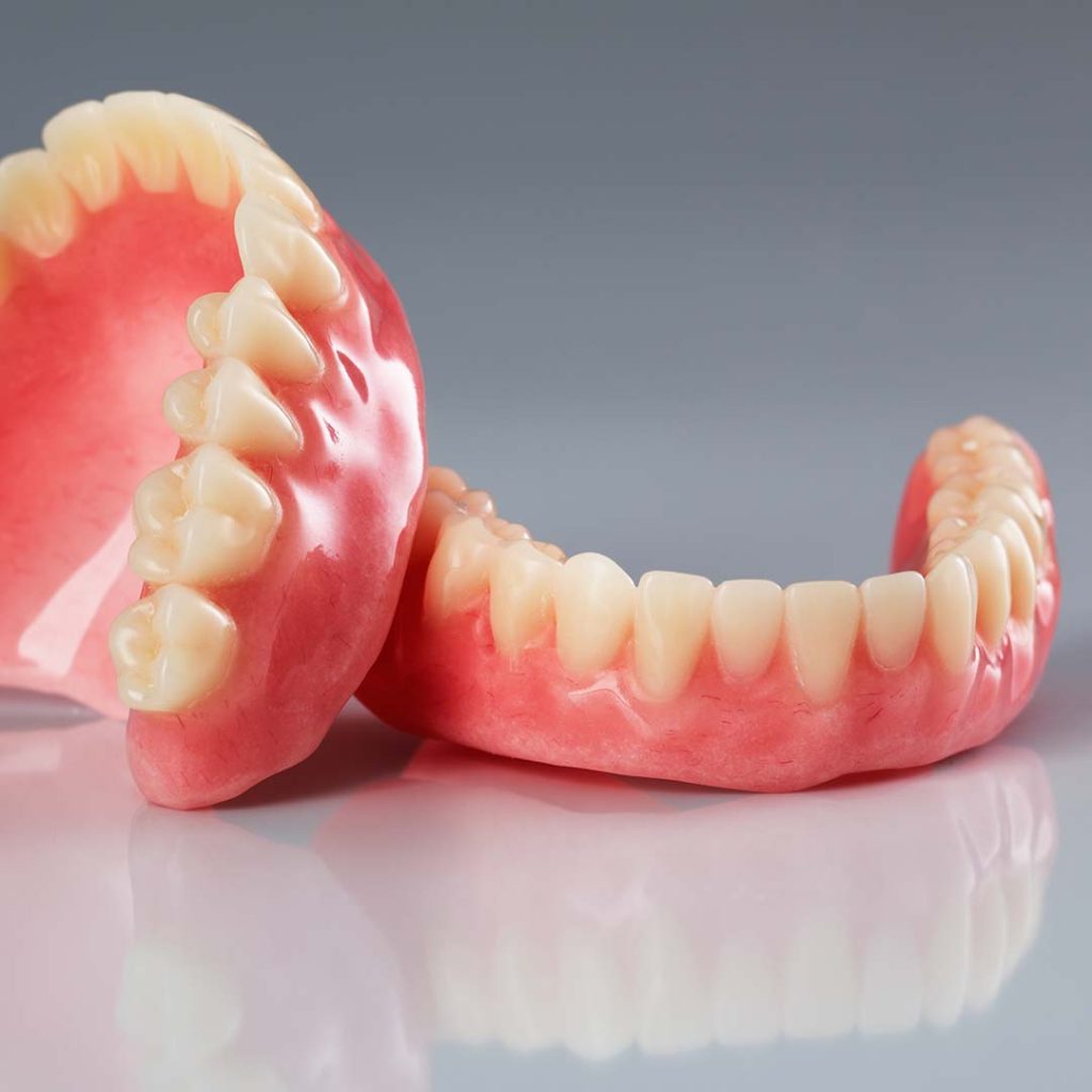 Dentist performing a custom denture procedure at Elite Dental & Wellness in Mesa, AZ