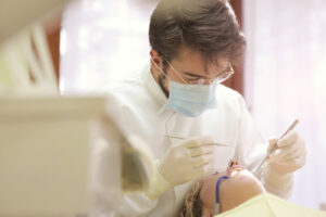 Dentist Working on Patient - dentists mesa
