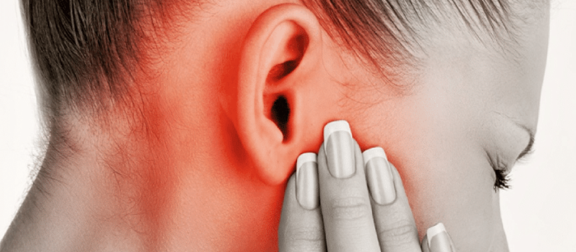 Woman Experiencing Severe TMJ Pain